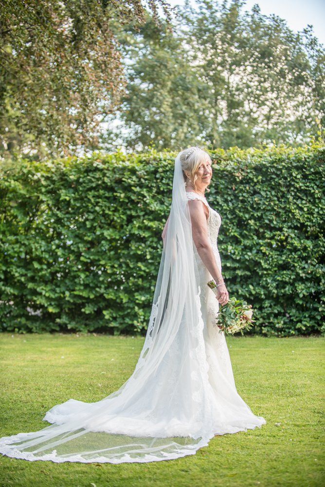 Caroline's stunning wedding gown from behind,  Hotel Van Dyk wedding photography Chesterfield