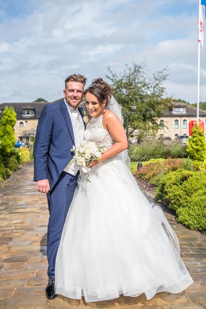 cuddles in the grounds, Waterton Park Hotel weddings, Yorkshire wedding photographers