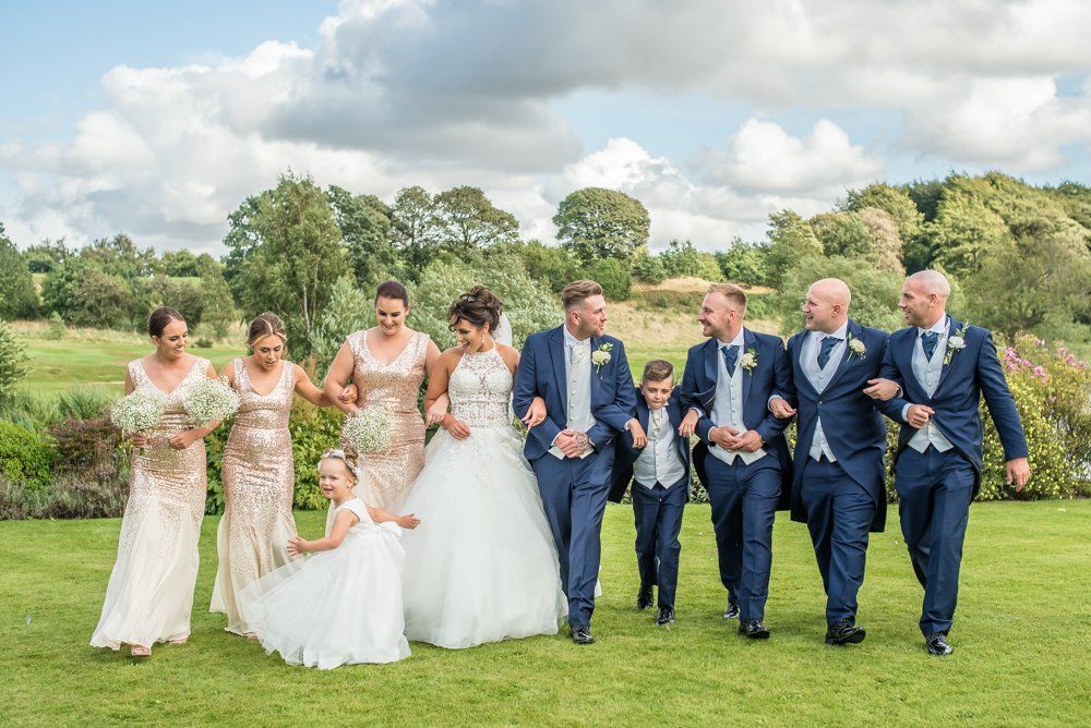 Bridal party walking together, Waterton Park Hotel weddings, Yorkshire wedding photographers