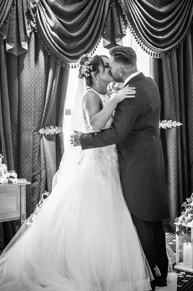 Bride and groom first kiss, Waterton Park Hotel weddings, Yorkshire wedding photographers