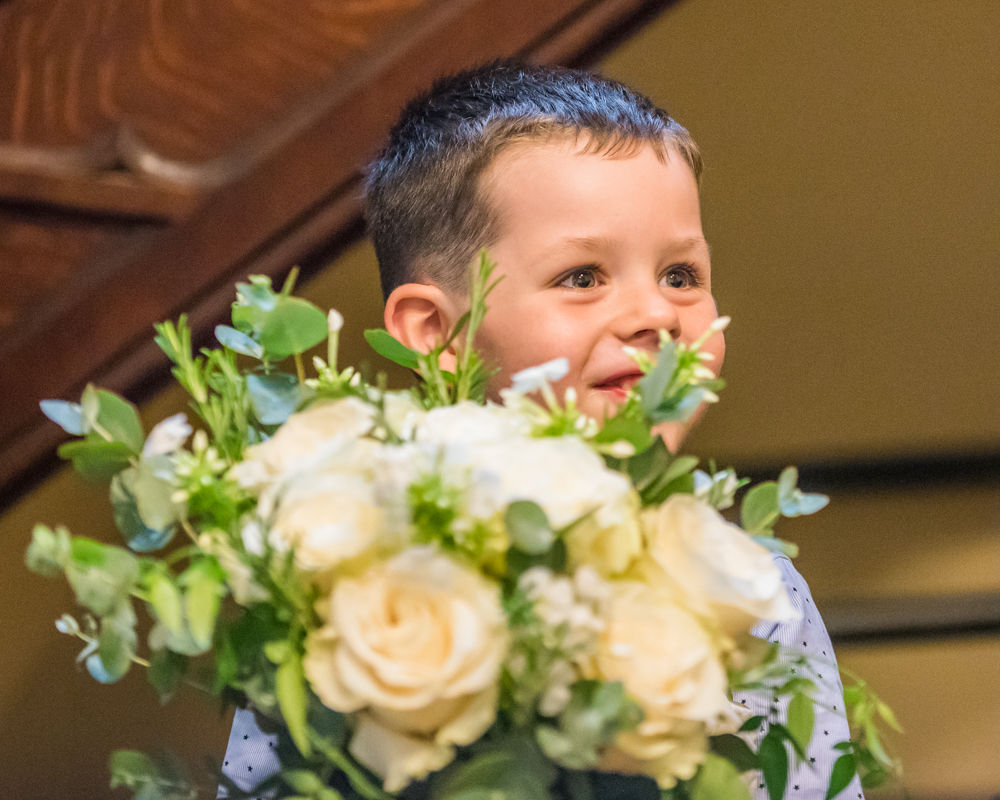 pageboy holding mums bouquet, Lady Gilford's House, Carlisle register office, Cumbria wedding photographers