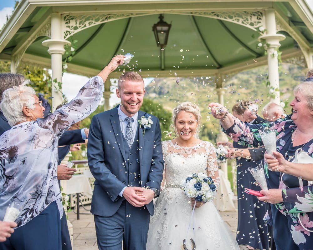Confetti walk down aisle, Inn on the Lake Weddings, Lake District