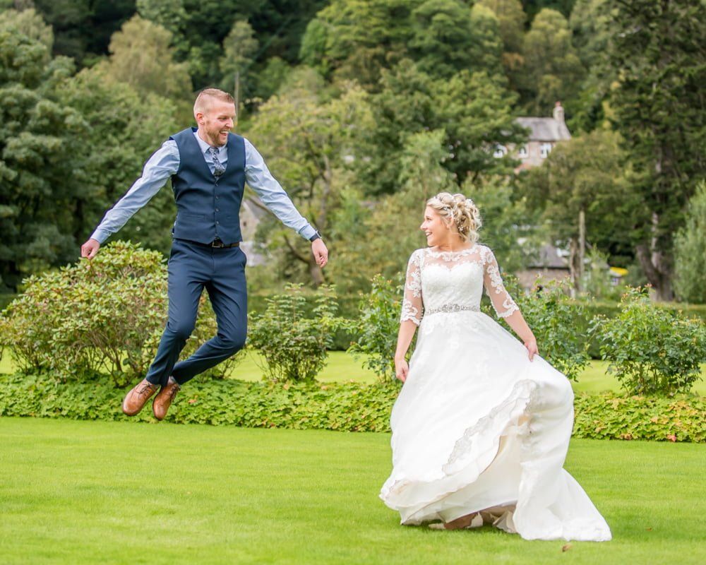 Groom jumping for joy, Inn on the Lake Weddings, Lake District