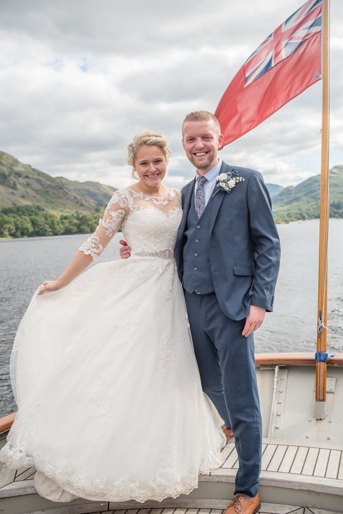 Bride and groom on steamer, Inn on the Lake Weddings, Lake District