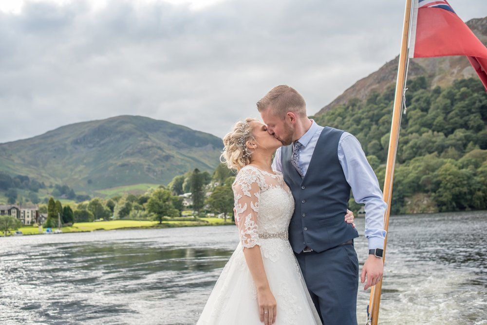 Kisses on the steamer, Inn on the Lake Weddings, Lake District