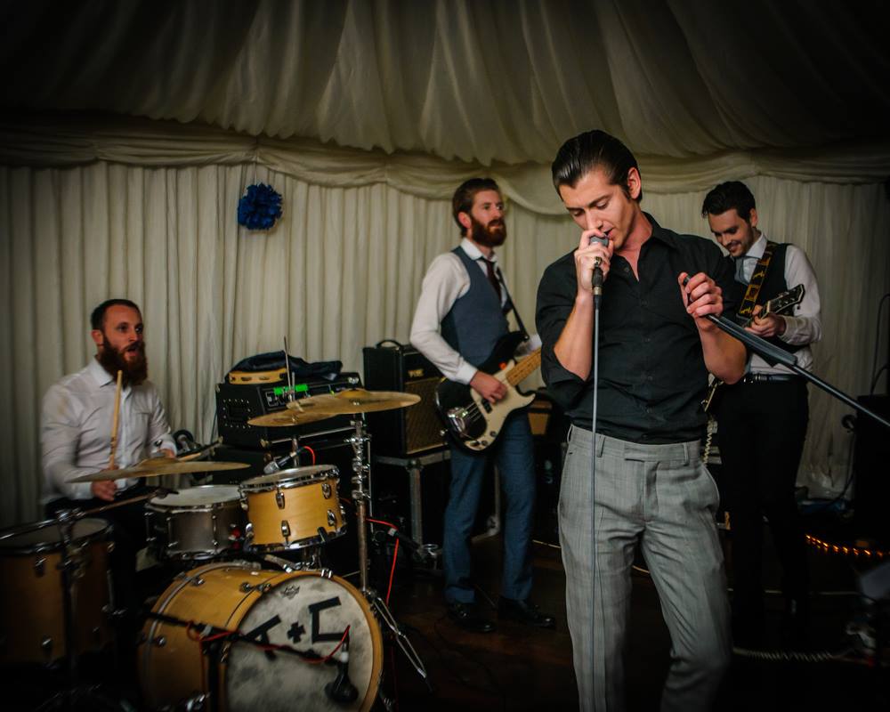 Arctic Monkeys band singing at wedding, Sheffield wedding photographers