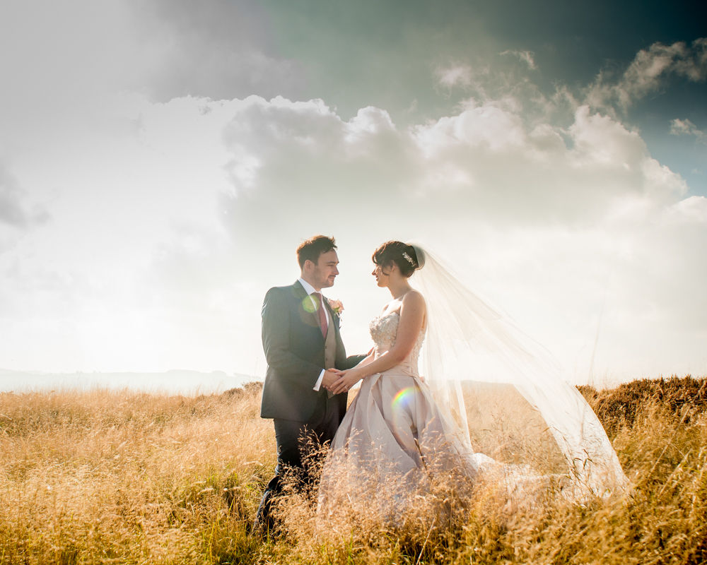 Bride and groom in sunshine, Peak District, female wedding photographer, Sheffield weddings