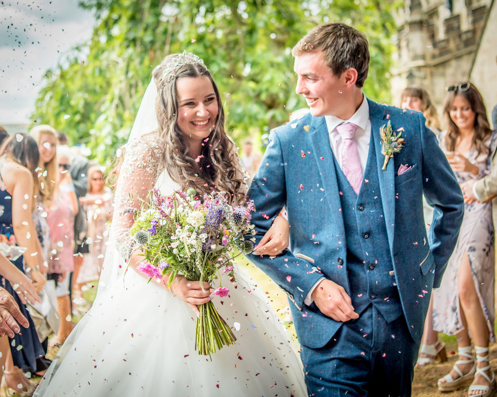 Walking through confetti, Lake District alternative wedding photographers