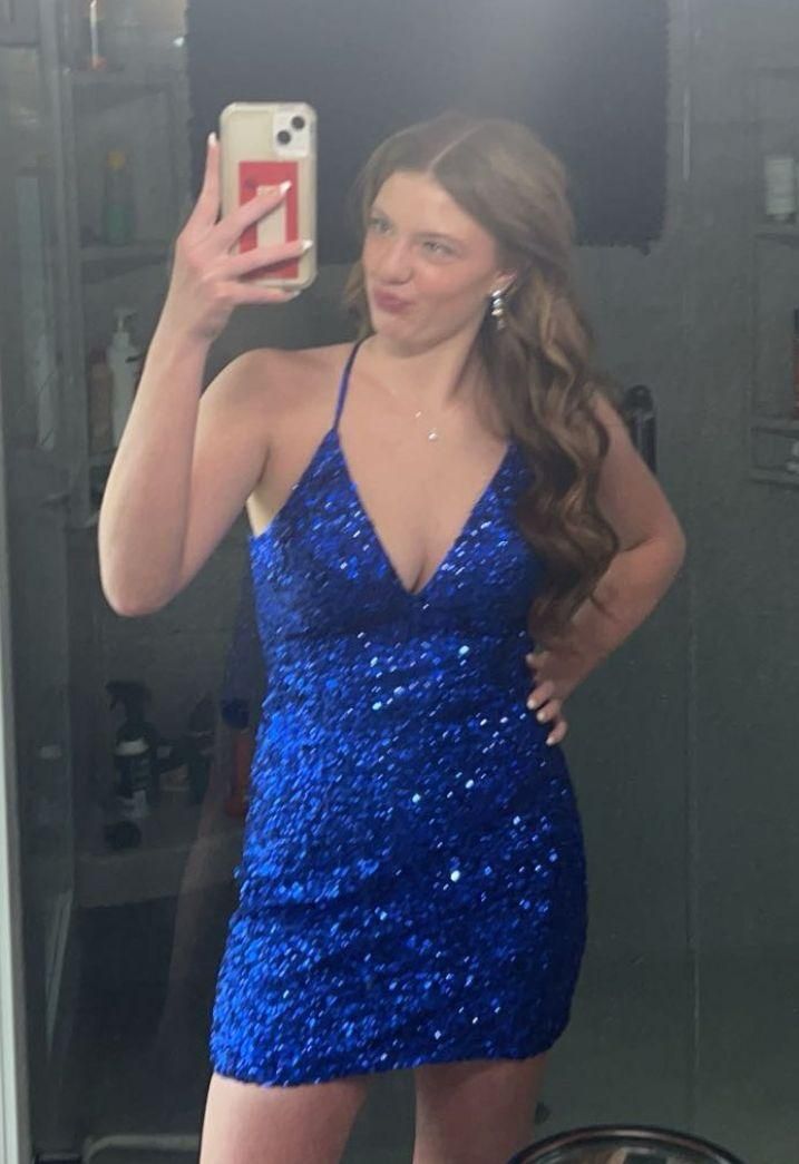 Cobalt blue sequin mini homecoming dress with a fitted silhouette.