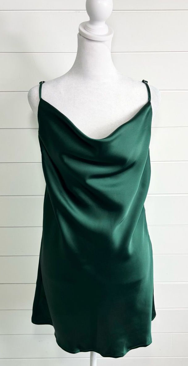 Deep forest-green satin cowl-neck mini dress on a mannequin.