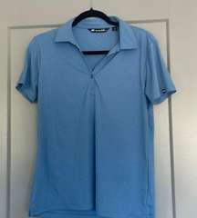 Blue Travis Matthew collared golf shirt