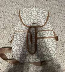 brown and white backpack