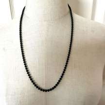 Oops a Daisy black beaded long necklace