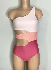 New. Pilyq peach/pink cut out one piece. Medium   Retails $144