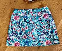 Floral athletic skort with side zipper detail