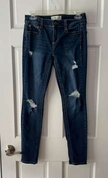 Dark blue ripped skinny jeans