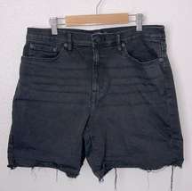 Calvin Klein Jeans high rise faded black distressed Bermuda shorts 12