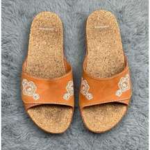 Patagonia orange swell floral leather slides