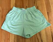 green sweat shorts