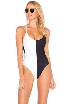 New. Pilyq Black and white one piece.￼