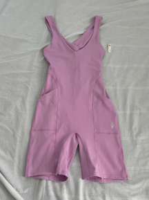 Here On Out Strappy Onesie Romper   Size XS  Condition: NWT  Color: bright orchid   Details : - See photo for approx. inseam measurement laying flat  - Built-in bra - not padded - Side pockets.