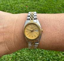 7N83-0049 Day Date Two Tone Stainless Steel 24mm Case Quartz Ladies Watch