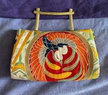 Natori embroidered clutch bag