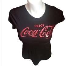 Coca Cola black tee shirt. Size Junior L. 15-17. Sort sleeve. 100% cotton