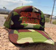 Somebody’s Problem Trucker Hat. 