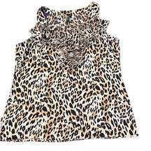 Milano animal print sleeveless blouse w/ ruffles perfect to accent any outfit