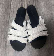 Rothy’s white triple band sandals