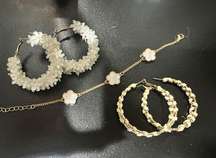 Two pairs of earrings and a bracelet