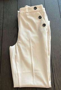 H &M Dress pants. In good condition. Minor flaws noted. Size 4 . Color : Ivory.