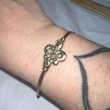 Gold Tone JM Collection Wire  Fleur-de-lis Hook and Loop Bangle Bracelet