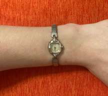 Woman’s stainless steel Swiss wind up  by bulova wrist watch!