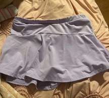 Varsity tennis skirt! size medium can fit a small too! worn maybe 3 times!