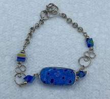 Artisan made silver and blue Milliflori beaded bracelet