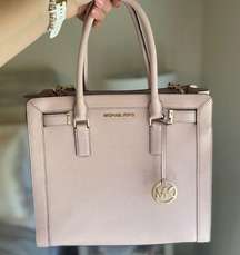 light baby pink handbag with shoulder strap