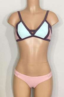 New. Pilyq blush/pink, brown, mint bikini. D-cup top/ S-bottom. Normally $168