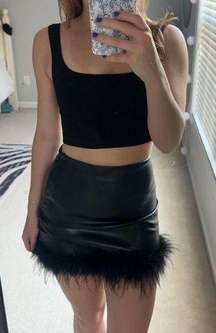 Leather + feather mini skirt