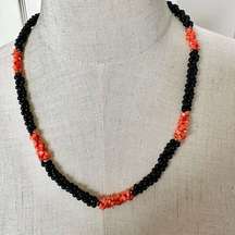 Black onyx  beaded and coral long twisted necklace
