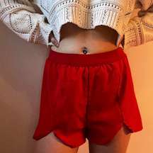 red shorts w/ slits |  | size small