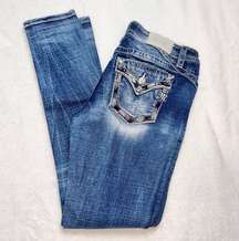 Los Angeles Distressed Mid Rise Skinny Jeans!