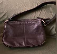 DKNY brown shoulder bag. Inside zip pocket. Zip closure. DKNY marking on strap