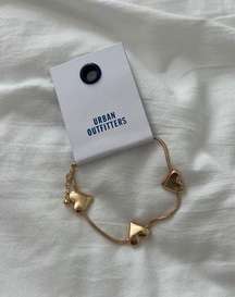 Urban outfitters heart bracelet   One Size  Condition: NWT Color: gold