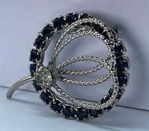 Vintage blue and clear crystal brooch