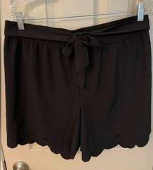 C Est 1946 black shash tie front pull on scallop hem shorts.