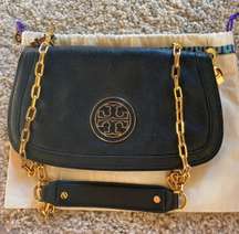 black leather purse with gold chain