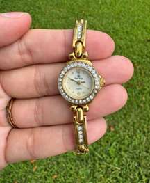 EUC  Analog Gold Wristwatch with Quartz Movement - 7”