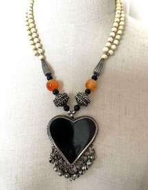 Tribal bone beaded carnelian and onyx heart pendant necklace